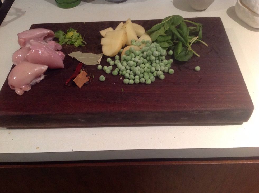 Making chicken curry will require chicken,peas,herbs and spices (chilli,bayleaf,pepper), coriander,cardamon clove,1 potato(varies on serving size),oil & curry paste