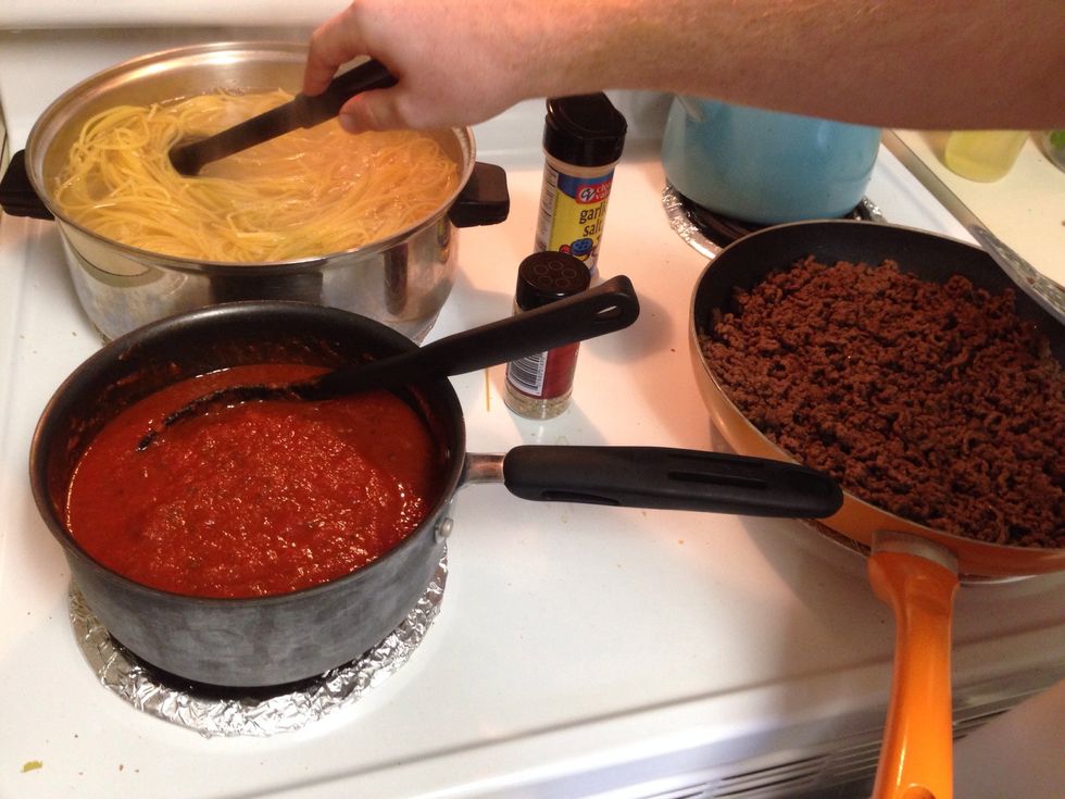 Making the spaghetti; Thick not runny otherwise your bread will get soggy.