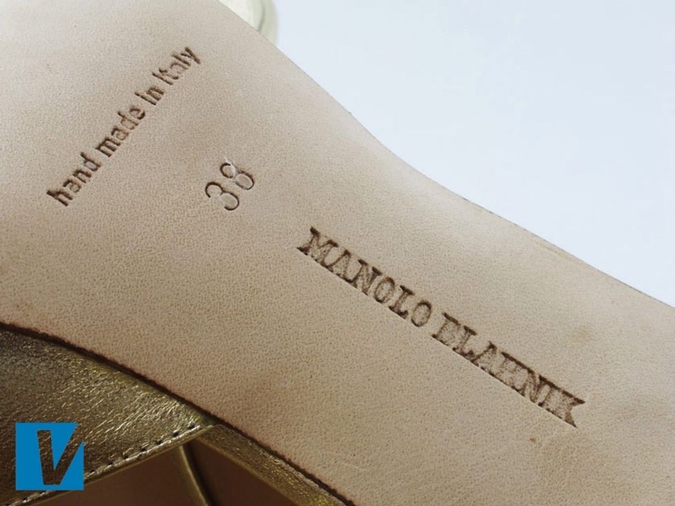 Manolo Blahnik soles are made of real leather. They feature the 'MANOLO BLAHNIK' logo, the size, and 'Handmade in Italy'. Some variations do exist such as just featuring the words 'Made in Italy'.