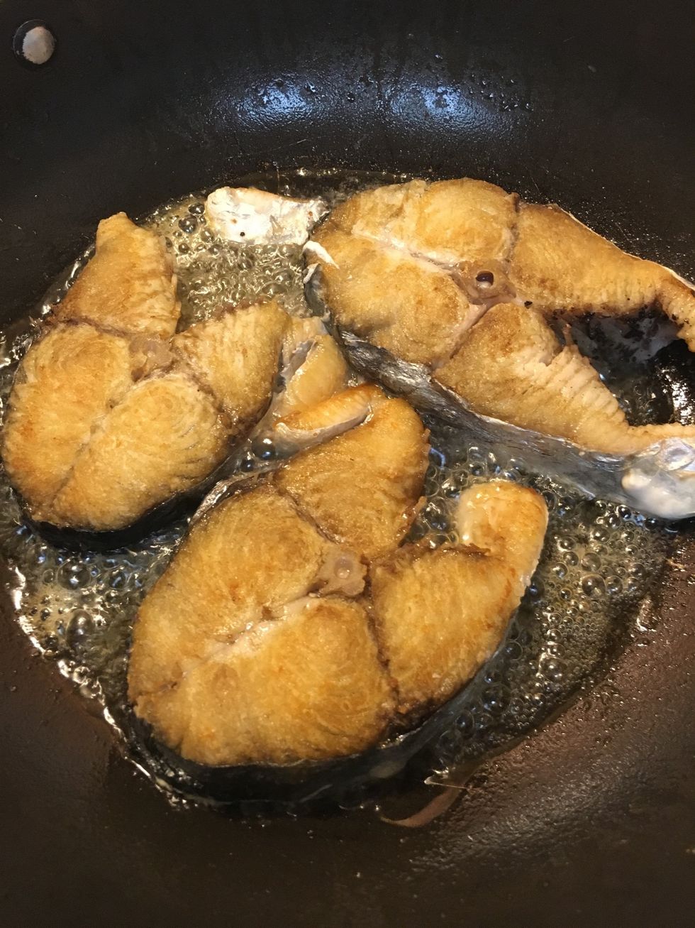 Marinate fish in a little salt to remove smell, set for 10 minutes, then fry