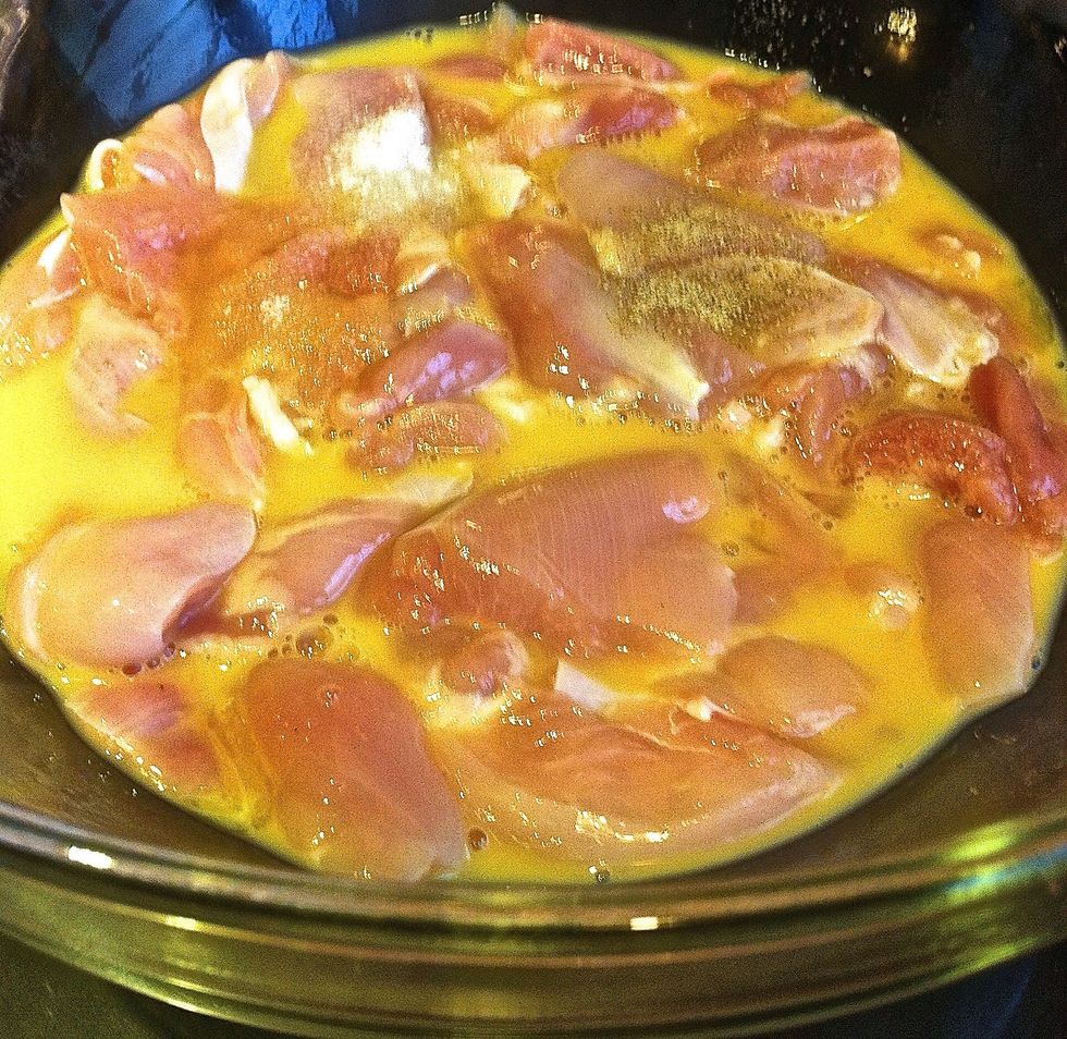 Marinate the bite size chicken meat for at least 15 to 30 minutes.  Marinate: 1 egg, 1 tablespoon Chinese wine, 1/2 teaspoon salt, 1/2 teaspoon sugar, 1 teaspoon baking soda, pinch of salt.