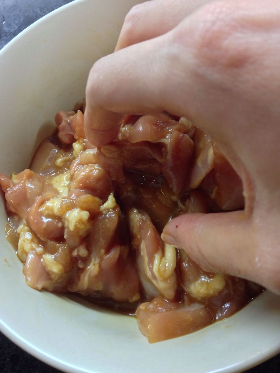 Marinate the meat with 2 table spoon soy sauce, 1 table spoon michu(cooking wine), and 1 teaspoon sugar. Massage the meat with your warm hand!