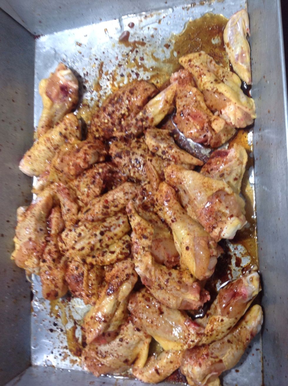 Marinate the wings, whit white wine, soy sauce, chili powder, vinegar, salt and pepper and oil, pre heat the oven 350, and let them cook for 20 min
