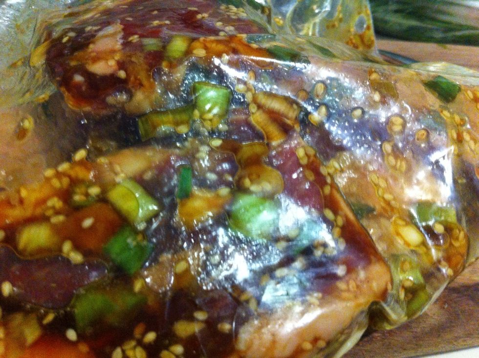 Marinated ribs in soy sauce, olive oil, sesame, ginger, garlic and scallions