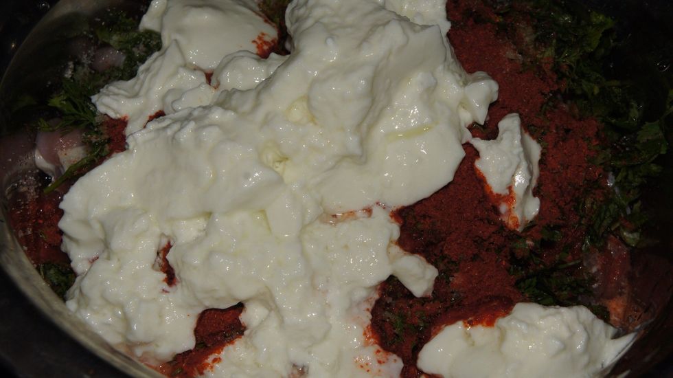 Marination Process: Add 300 gms of curd, red chilli powder and salt to the chopped mutton