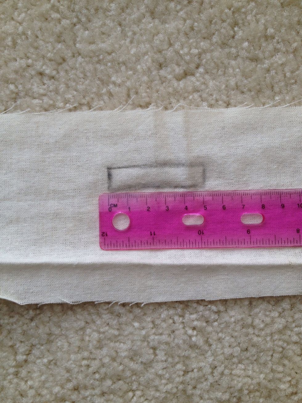 Mark a rectangle on your sheet of fabric. The width should be the same as the measurement you took in step 11. The length should be about 5-7 cm.