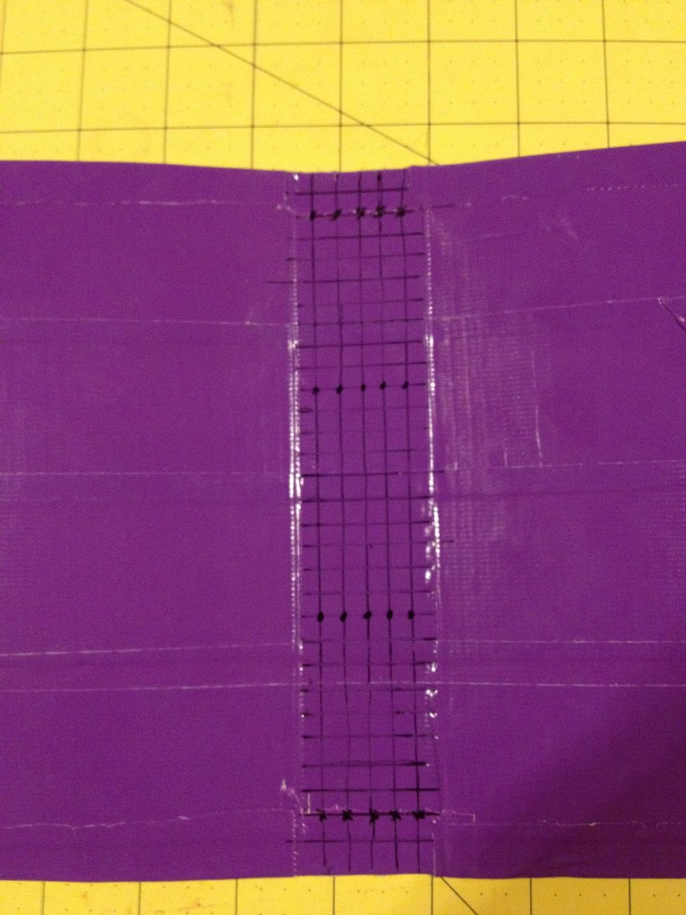 Mark every 1/4 inch on the inside binding. The number of intersections on the horizontal lines (in this case, 5) determines the number of paper sections you will have.