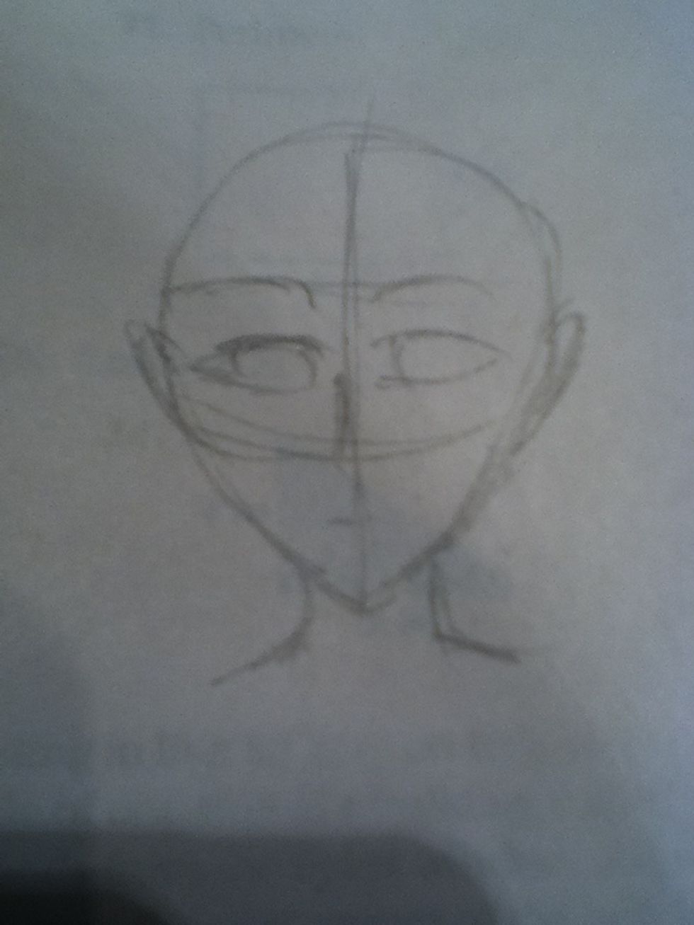 Mark in basic outlined for ears eyes nose an mouth. Light at this stage. This way you can change things later