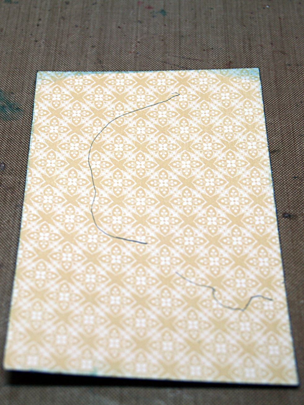 Mark on the back of the cut-apart the placement of your flowers.