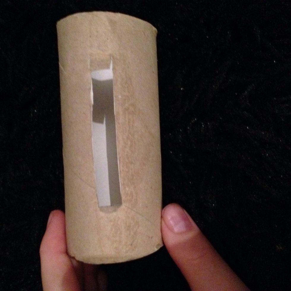 Mark out a rectangle with the same width and thickness of your device. Then, you can cut the shape out.