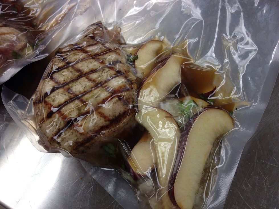 Mark pork chop on grill and add all ingredients to sous vide bag. Seal.