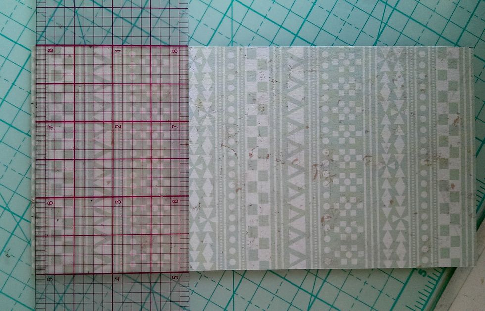 Mark the center point of the top of the tag, about 3/8\u201d down. Mark a diagonal line on each side, where you want the tag corners cut. I marked mine approx. \u00be\u201d down and \u00bd\u201d in on the top.