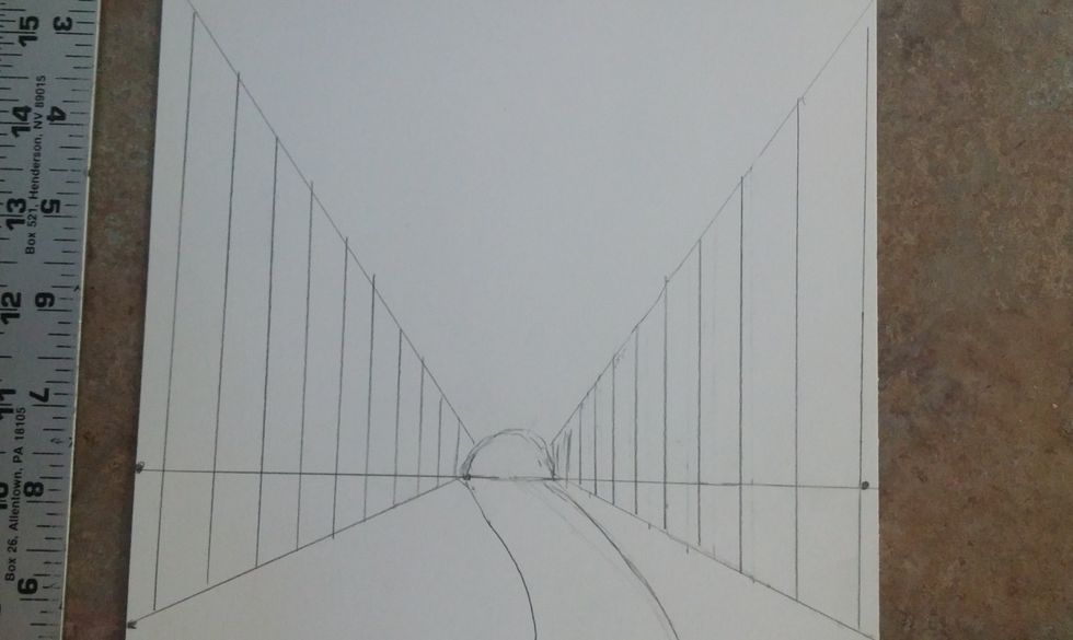 Mark where the trees will sit. Make straight up and down lines. make the ones closest further apart and the lines further away closer together and smalle. The lines go from top line to bottom line