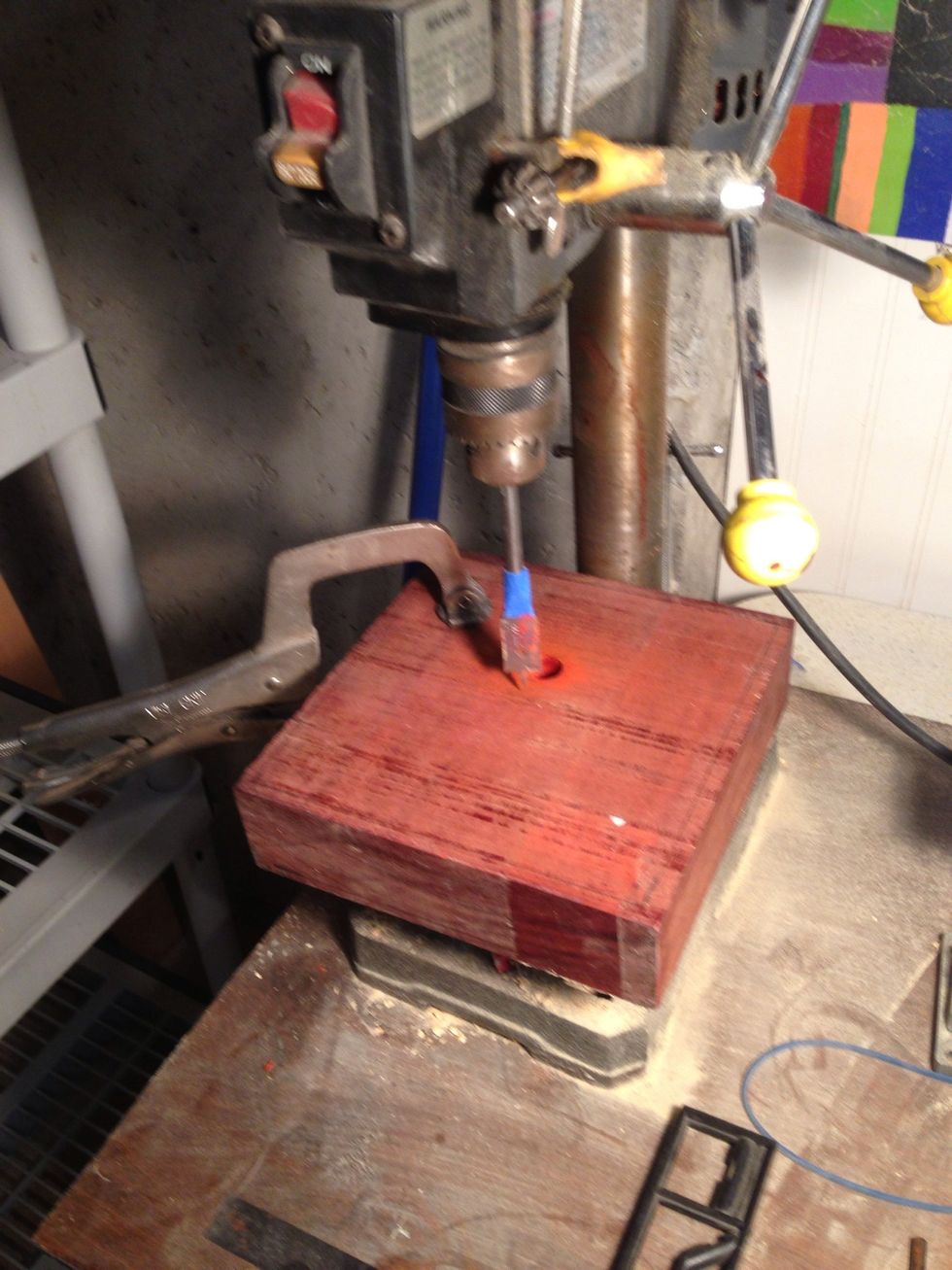 Mark  your pattern, set it up on the drill press and get comfortable. Check your depth don't go too deep.