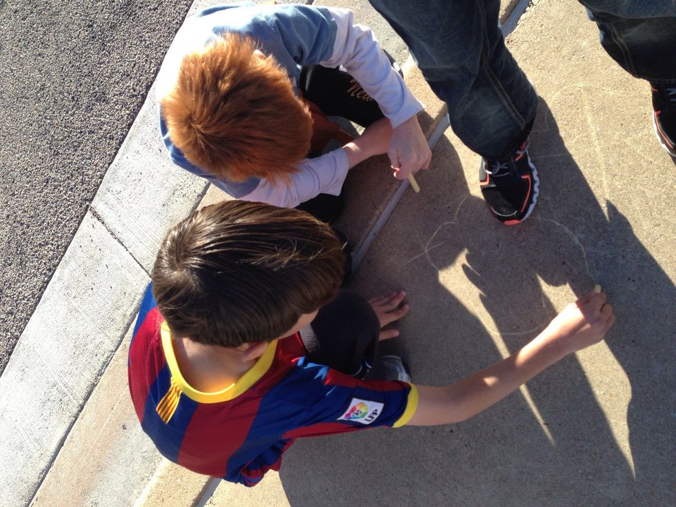 Marking Matthew's foot in the concrete