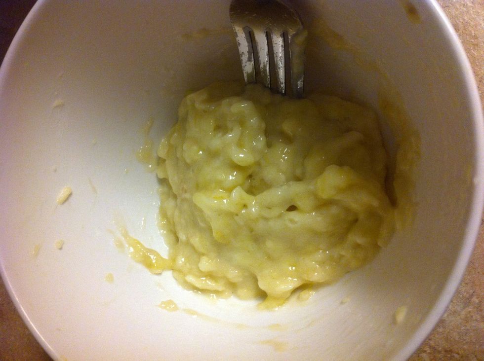 Mash banana with a fork until smooth.