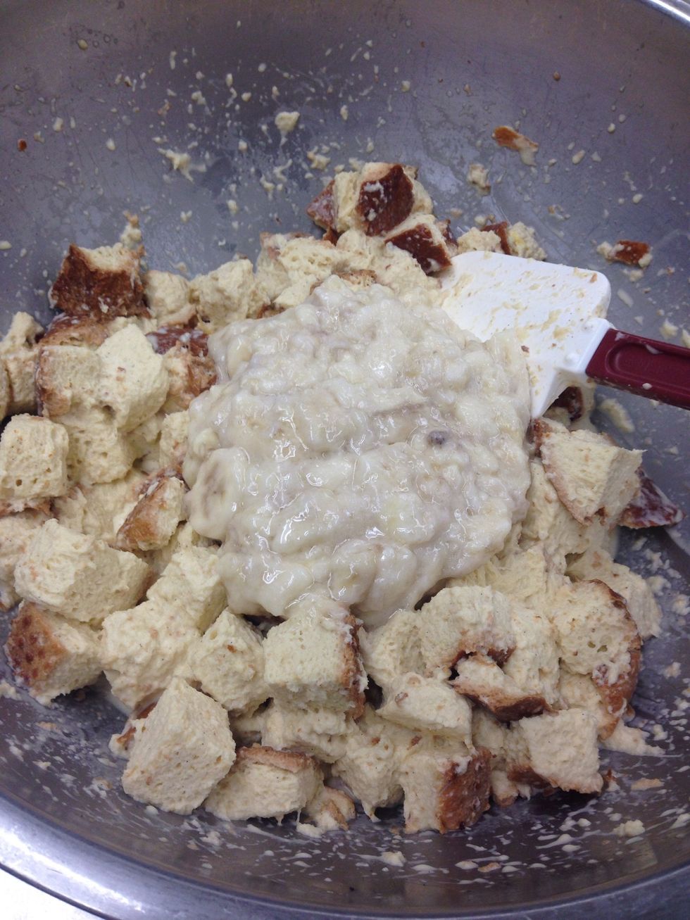 Mash bananas and fold in to the soaked bread mixture.