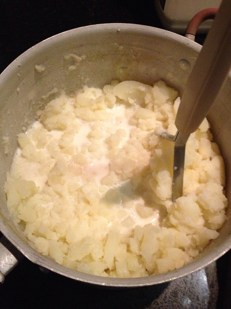 Mash potatoes with some milk butter salt and pepper
