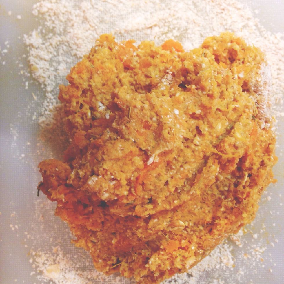 Mash sweet potato and mix with oats (except from 2 tablespoons) and mixed herb spice.
