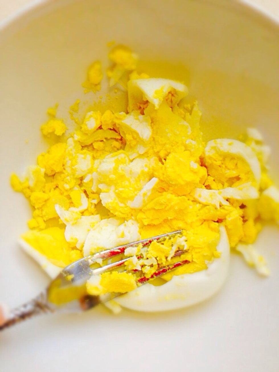 Mash the eggs with fork