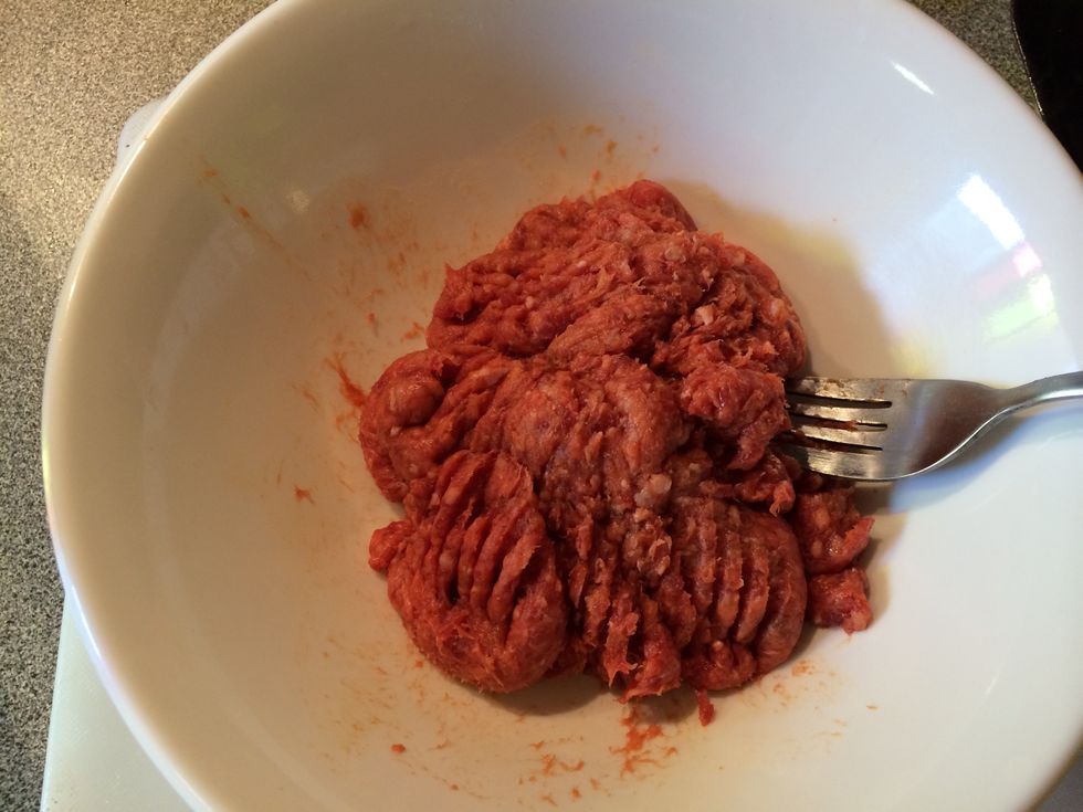 Mash the meat with a fork.