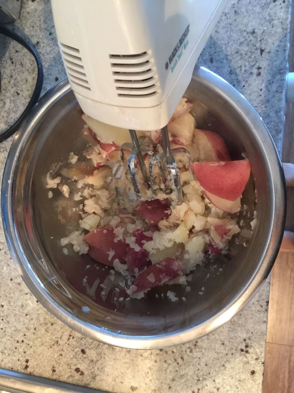 Mash the potatoes with mixer or fork