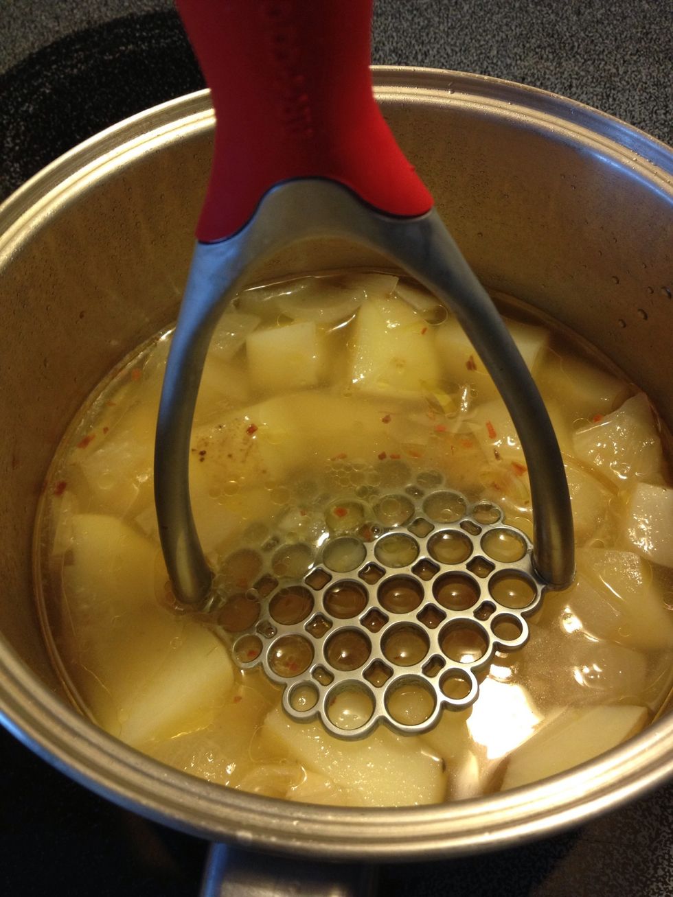 Mash the potatoes. You can use an immersion blender if you want a smooth texture. I like some texture and pieces of potatoes in my soup.