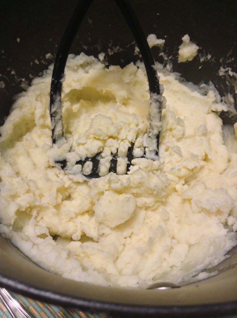Mash them thoroughly with a potato masher. While the potatoes are still hot, mix in the butter, milk, and salt. Taste the potatoes and add additional butter, milk, and salt to taste.