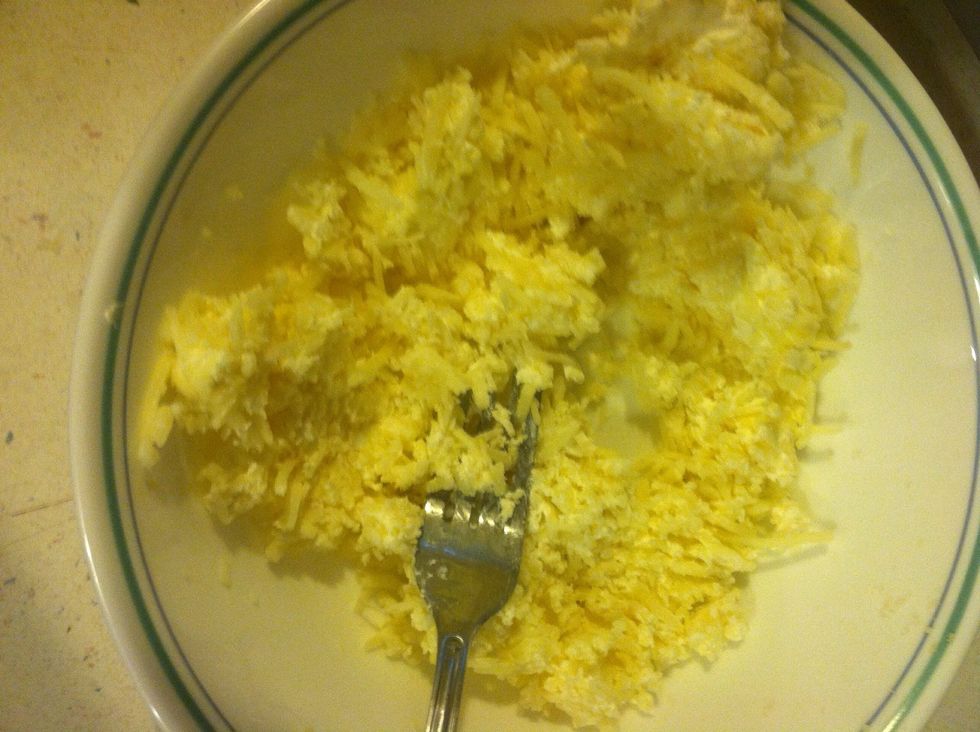 Mash together cheese with a fork- this is easiest if the cream cheese in room temperature.