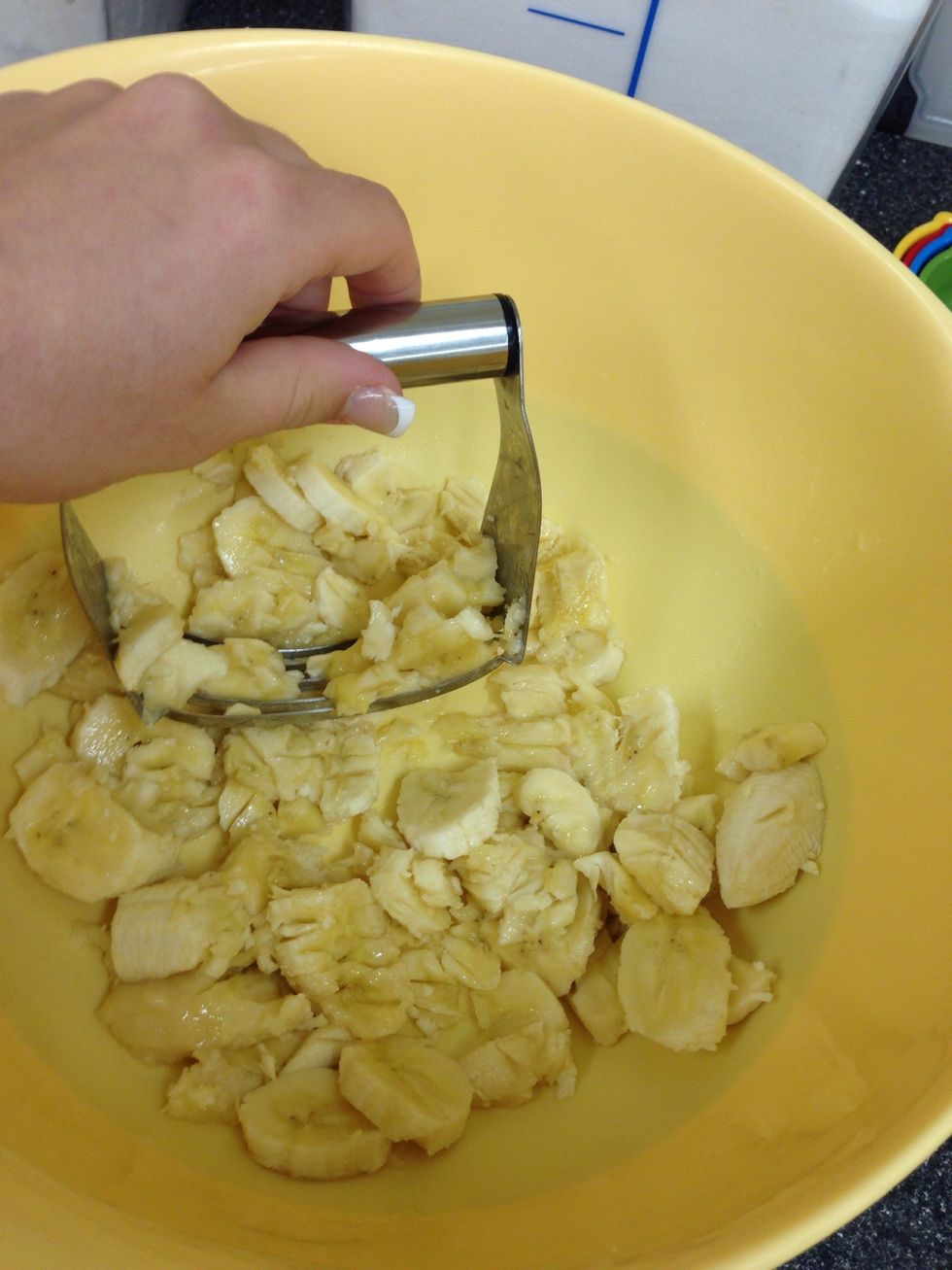 Mash up 3 ripe bananas