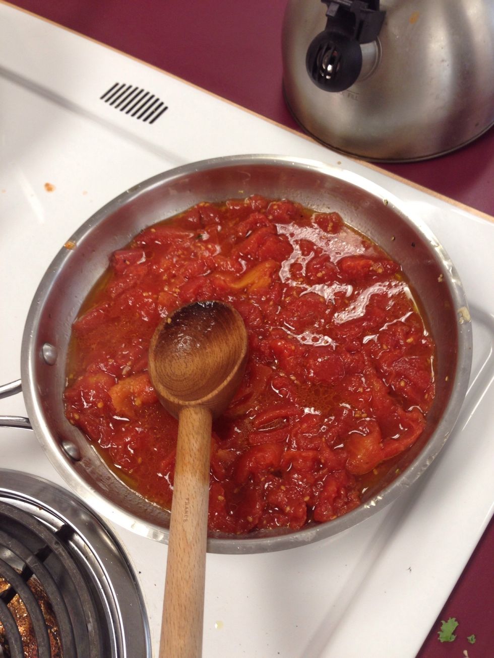 Mash with a wooden spoon until a thick sauce is formed