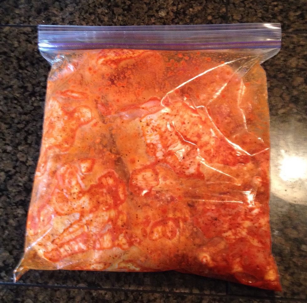 Massage the bag until every piece of chicken is coated in the marinade. You can let this marinade overnight, or you can used it right away. I use it right away, since it's going into the slow cooker.