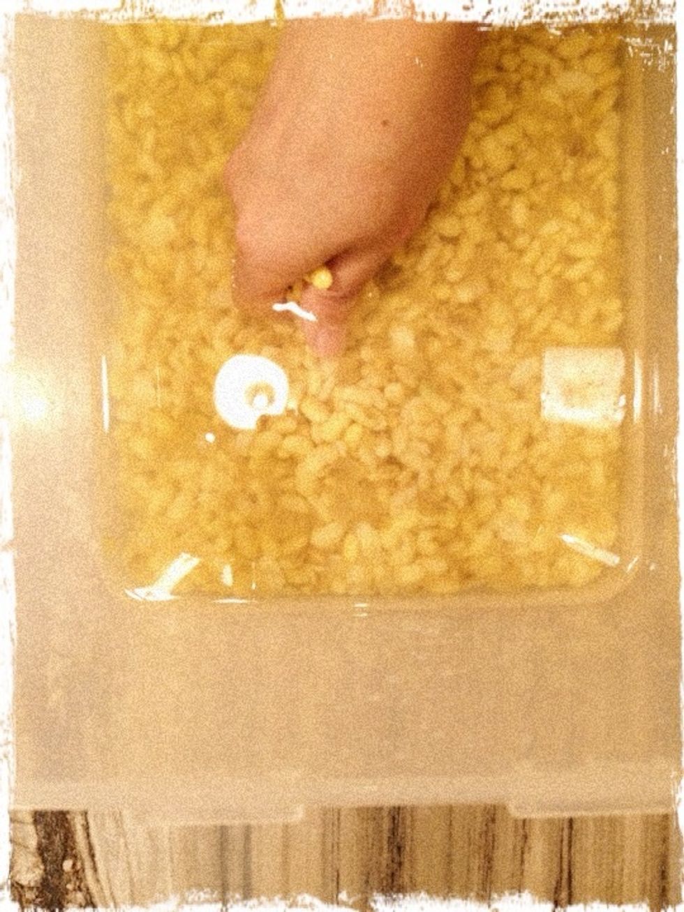 Massage the soaked beans in a large container to remove the skins for about 3-5 minutes