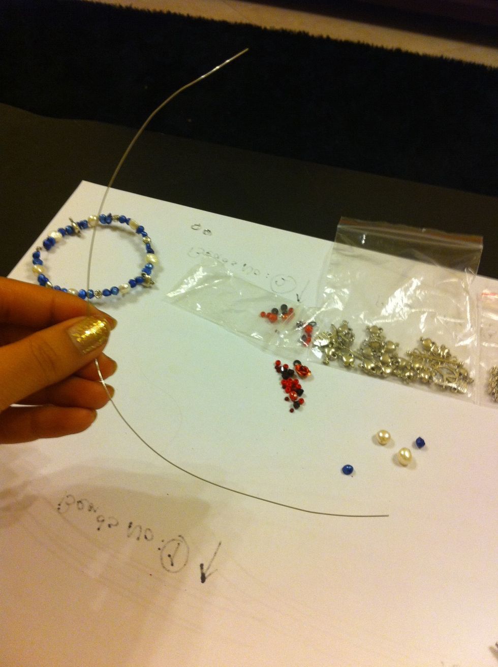 Masure your bracelet size. Cut the wire considering the desire size.