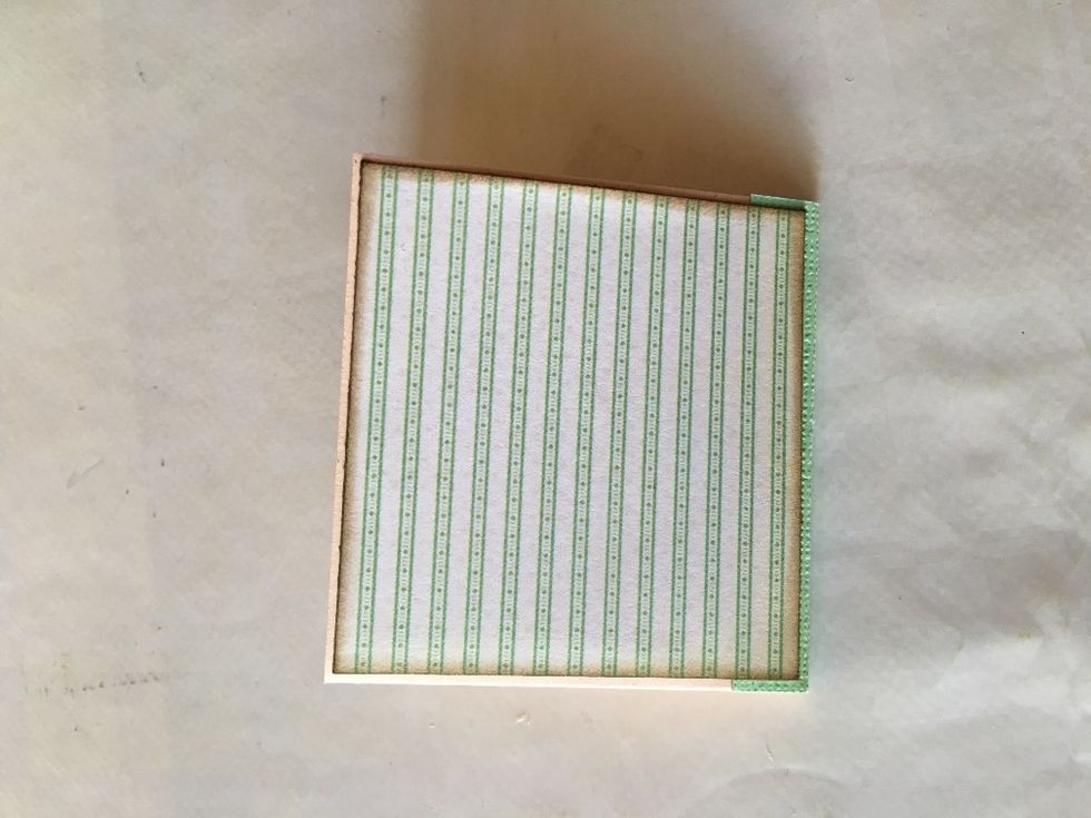 Mat the back cover, on top of the spine piece.