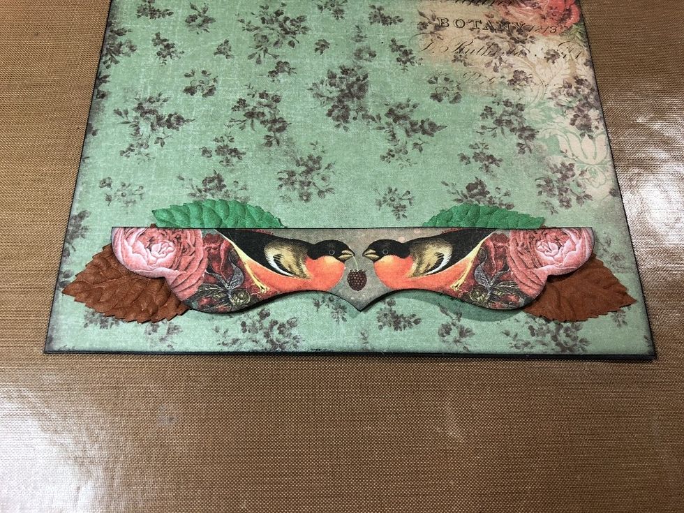 Mat the bottom panel. Attach the decorative piece with DIMENSIONAL tape - this is crucial, UNLESS you're planning on using sth. else bulky. You could also add some extra embellishments, like leaves.