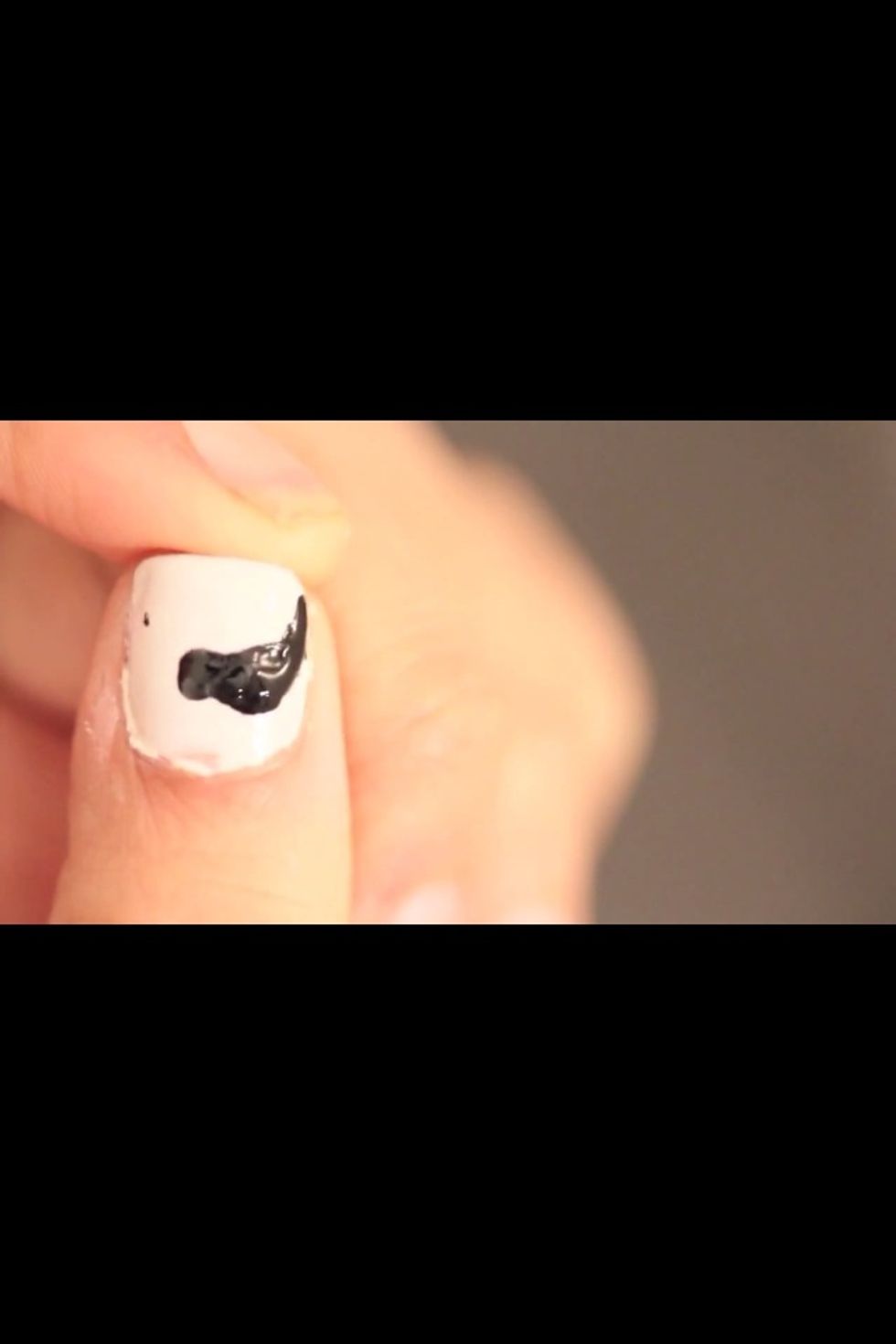 Match the circle whit the point at the top and make this to the other side.. making the a moustache shape