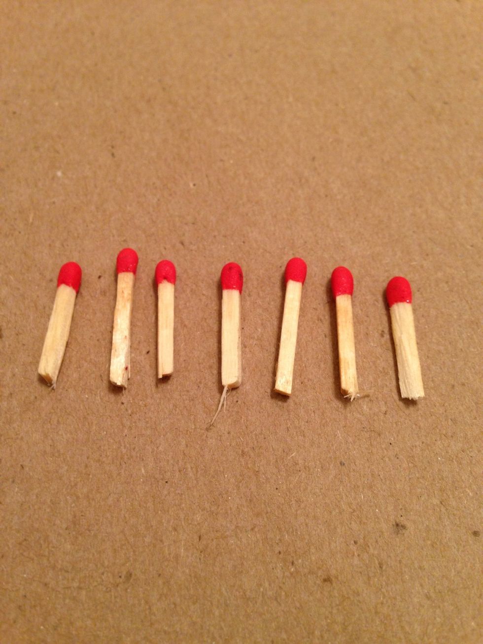 Matches snapped in half. Dipped in shellac to waterproof