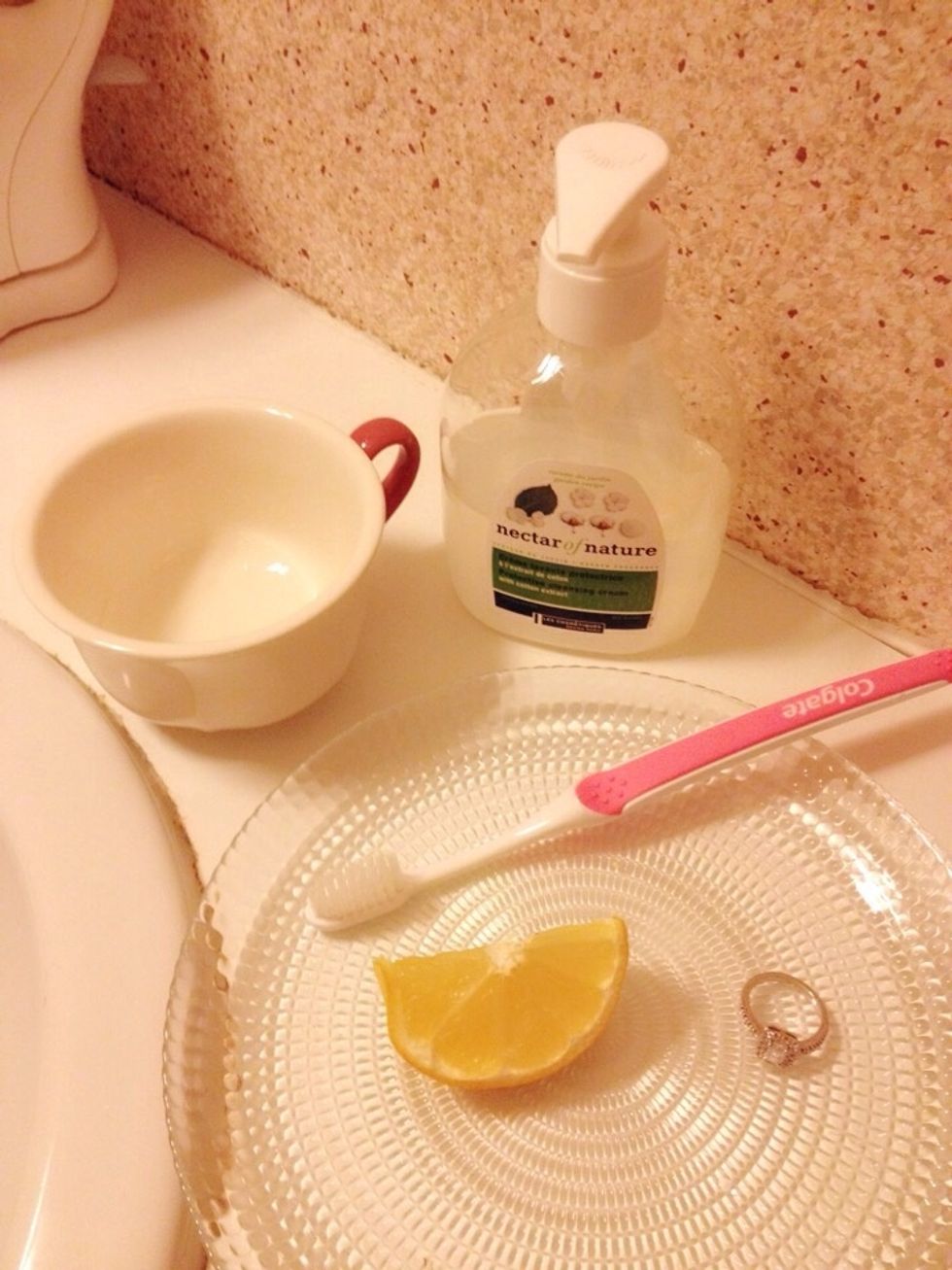 Materials: Hand wash (non moisturising), fine bristle toothbrush, cup, and a wedge of lemon (optional)