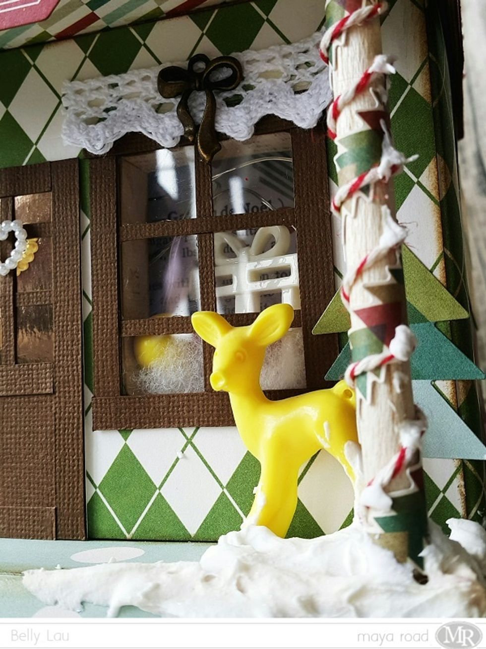 Maya Road Oh Deer Resin standing in front of the shop, some beads inside the windows which I bought from local shop.