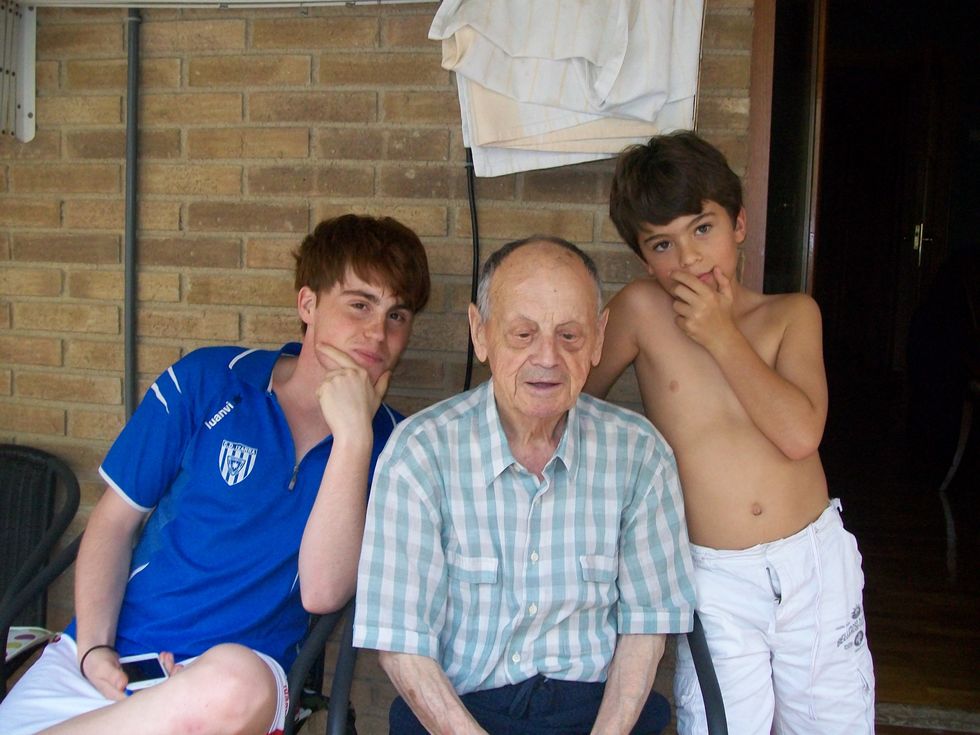 Me and my cousin with my grandfather