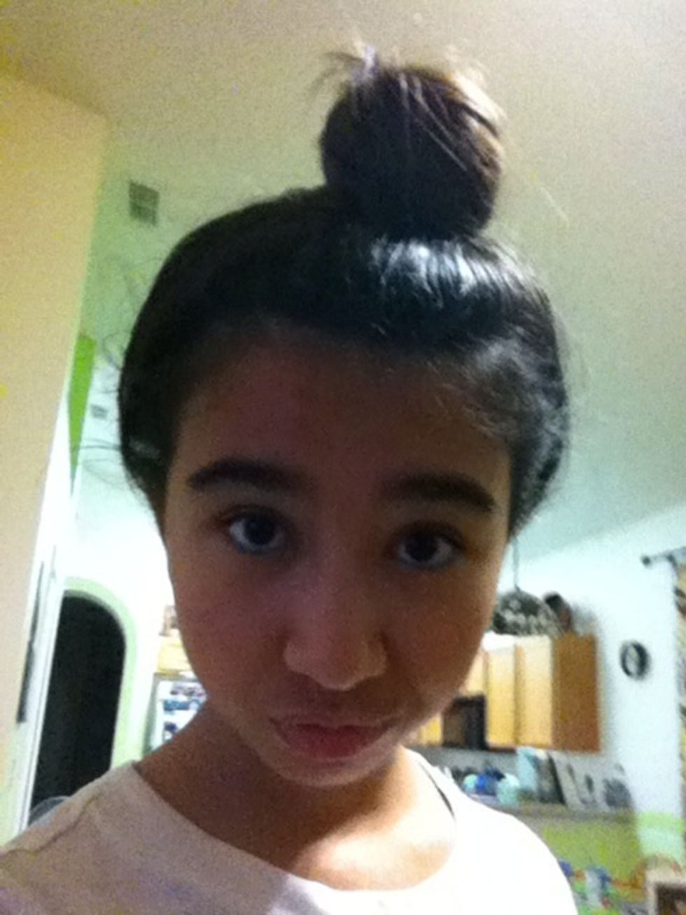 Me with a bun on the very top of my head lol