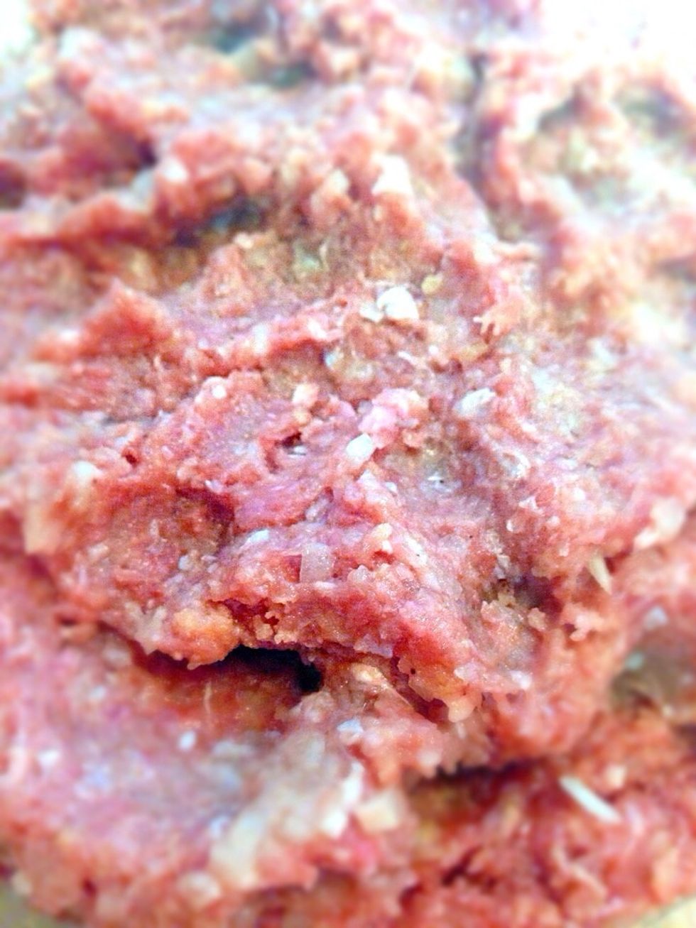 Meantime mix ground turkey with minced onions, Panko breadcrumbs, beaten egg, salt and pepper