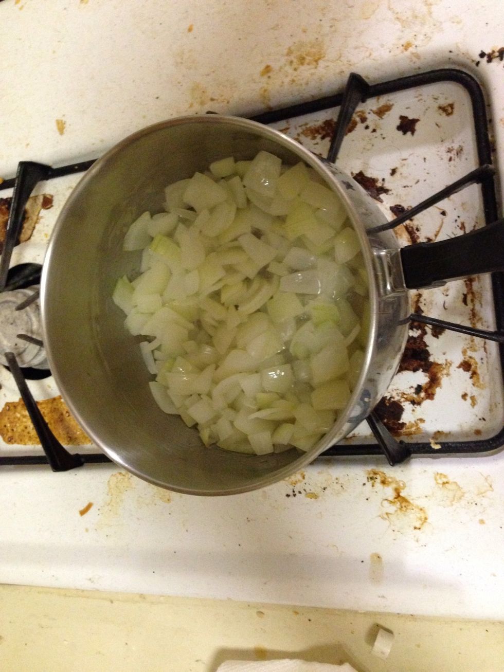Meanwhile add 3T oil and saut\u00e9 a med onion in a small pot