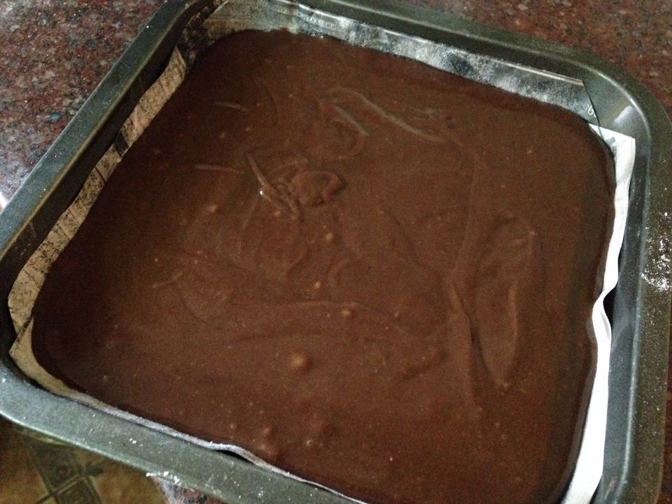 meanwhile add batter to prepared baking tray and bake it...... Prepared baking tray>> take baking paper or if u don't have that then newspaper. Grease it and then spread small amount of flour.