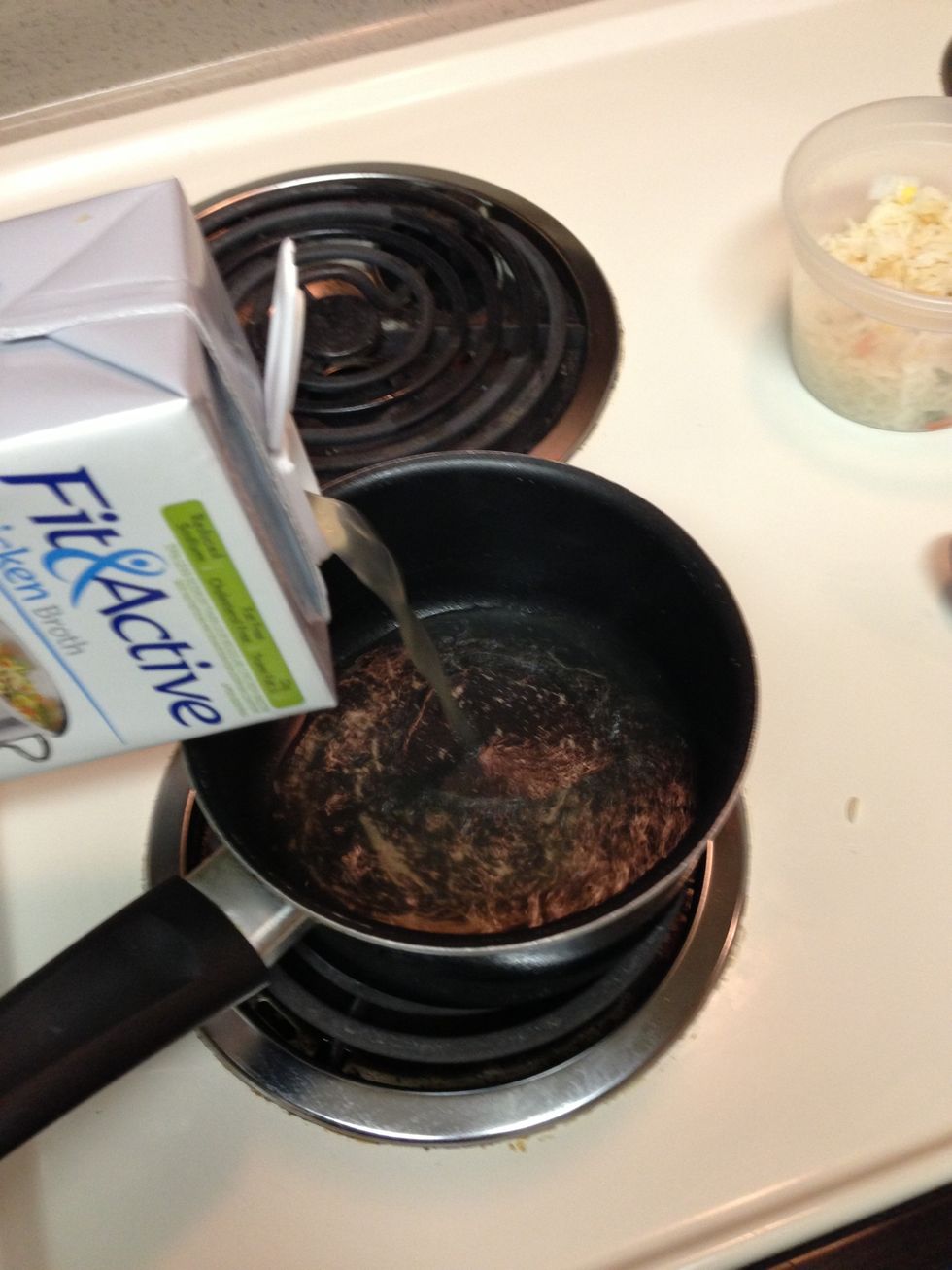 Meanwhile add the chicken broth to a pan. And let it boil in low heat