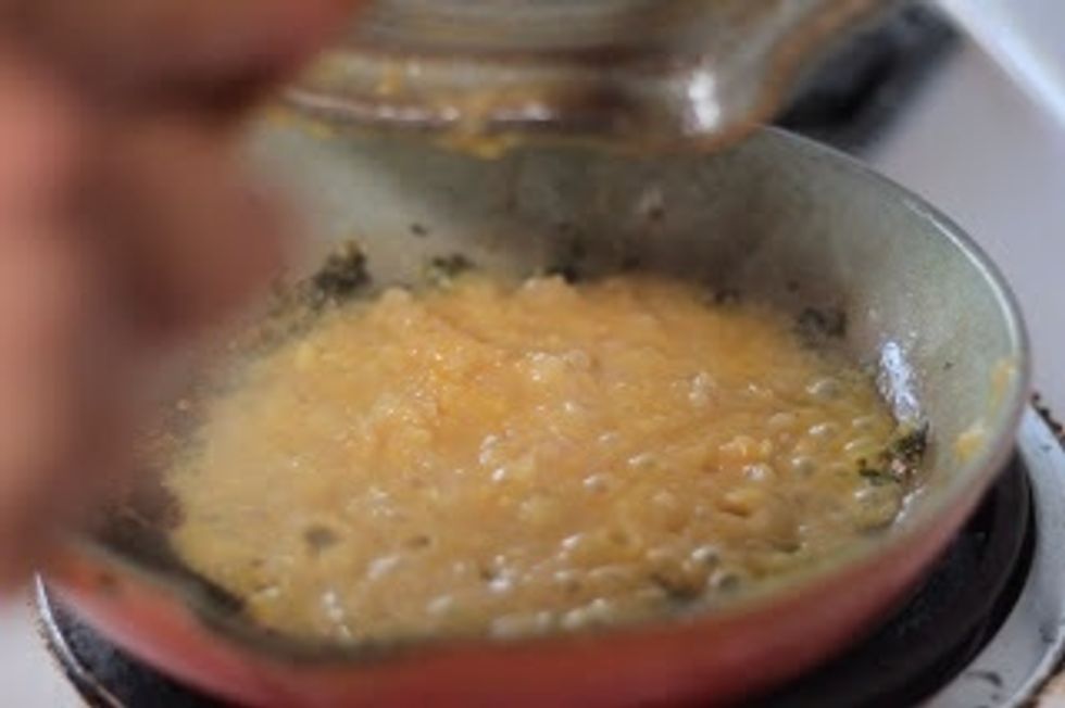 Meanwhile back at the pan...When the shallots are softened, add the blender ingredients to the pan and simmer until it's reduced  by about 3/4s.