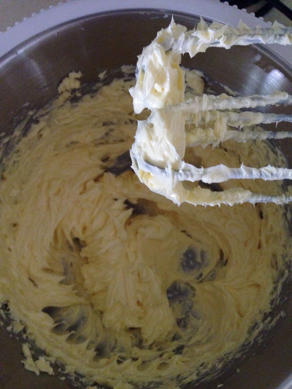 Meanwhile beat room temp butter until pale