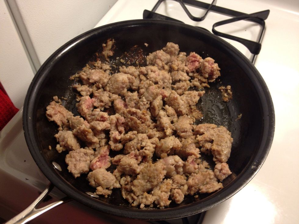 Meanwhile, brown the fennel sausage in a separate pan. Then add to the simmering stock pot. Continue to simmer uncovered for 30 minutes.