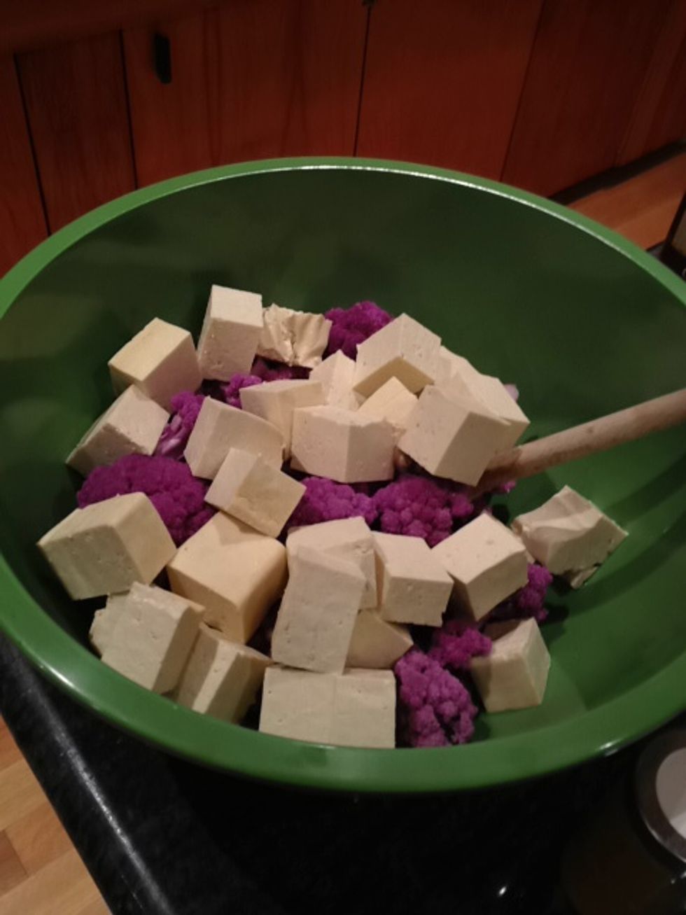 Meanwhile, combine the cauliflower and tofu in a large bowl.